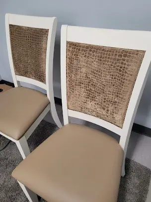Dining chairs recovered with a textured back rest and plain vinyl seats